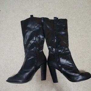 Black heeled leather boots size 8.5